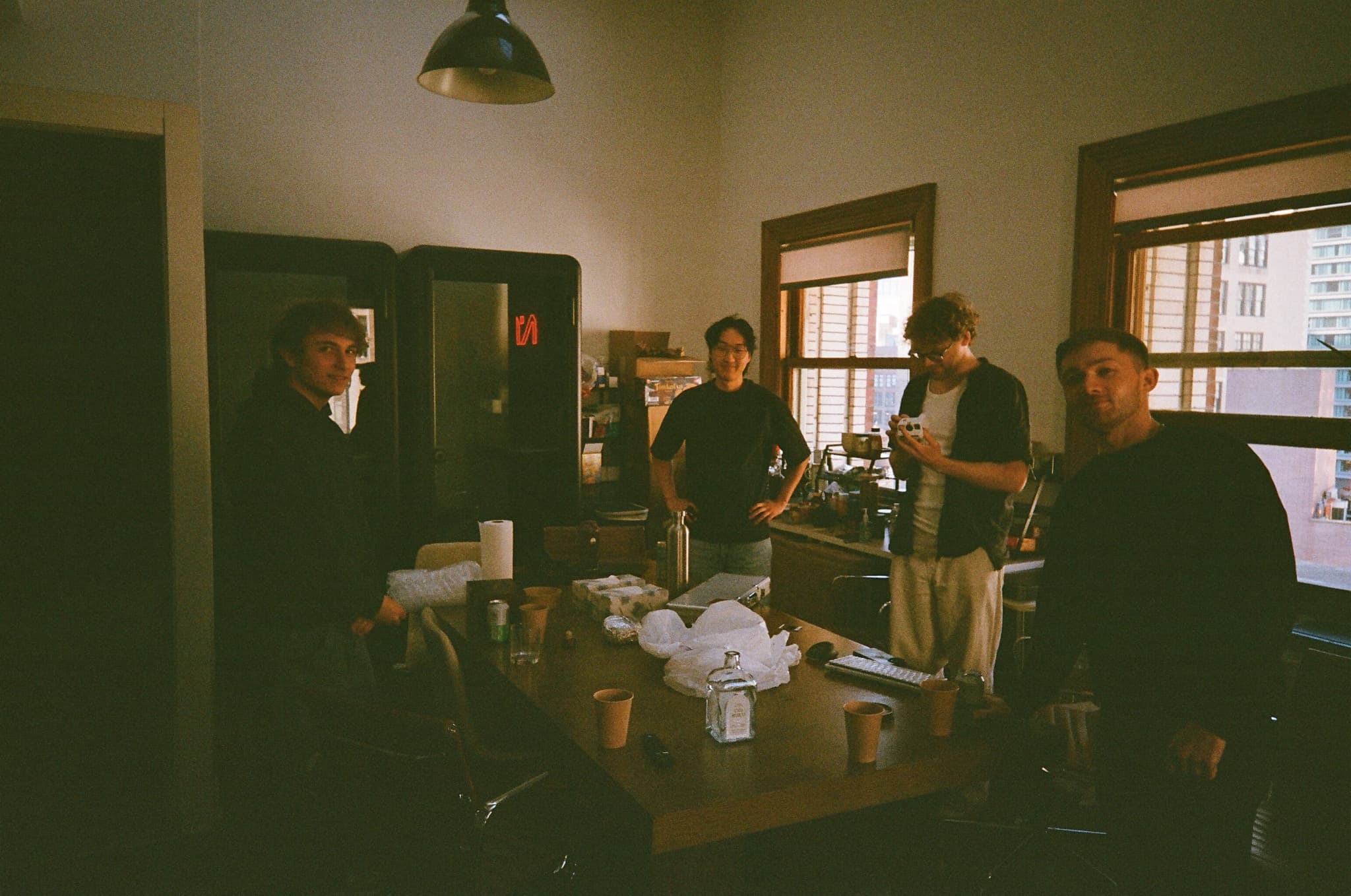 Null Studios team gathered in an apartment workspace